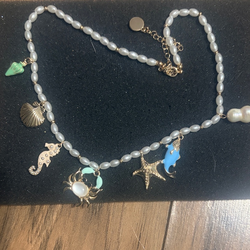 Gold and White Charm Necklace